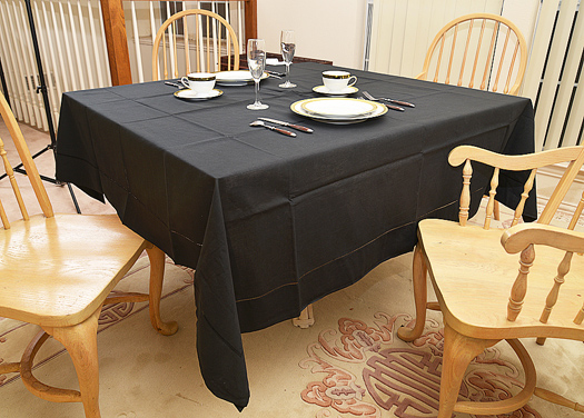 Happy Festive 70" square tablecloth. Pure Black
